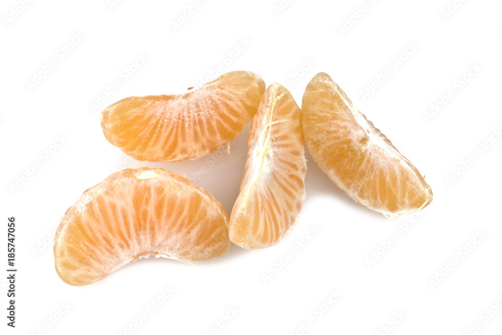 Mandarin or Tangerine fruit with leaves on a white background Mandarin or Tangerine fruit with leaves on a white background