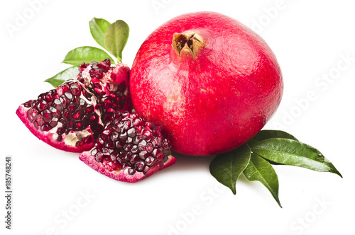 ripe pomegranate fruit and its grains on white background