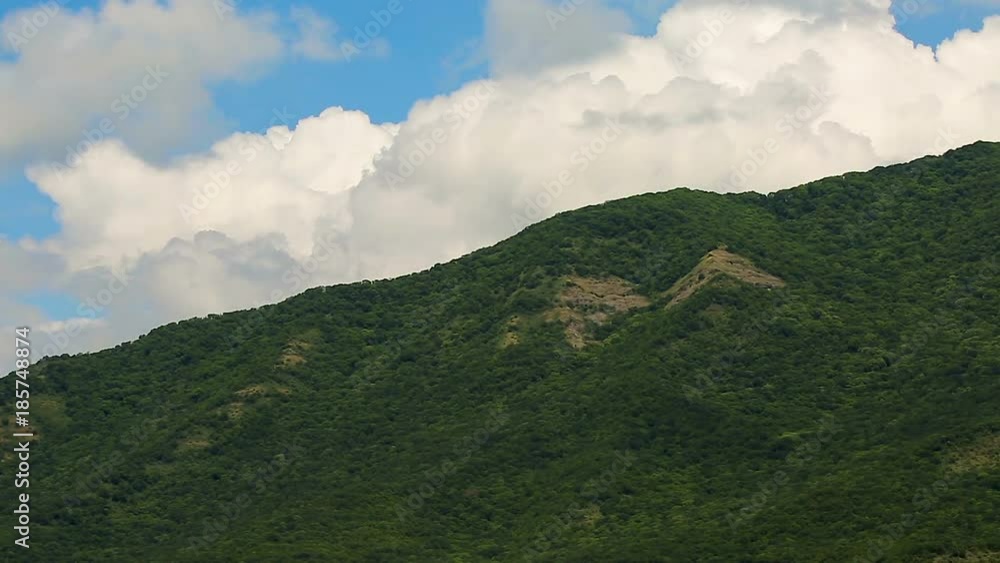 White clouds over the green mountains, beautiful nature time lapse, ecology White clouds over the green mountains, beautiful nature time lapse, ecology