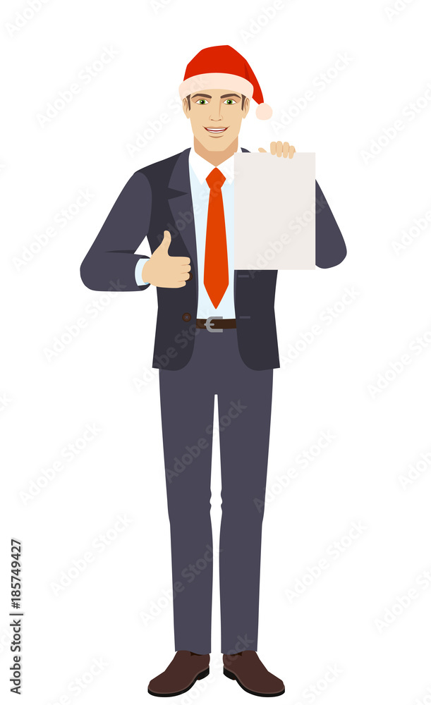 Businessman in Santa showing thumb up and showing the blank paper Businessman in Santa showing thumb up and showing the blank paper
