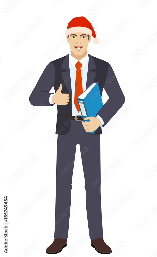 Businessman in Santa holding a folder and showing thumb Businessman in Santa holding a folder and showing thumb