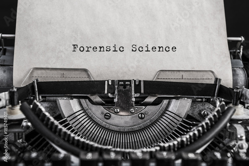 Forensic Science words typed on vintage typewriter. Close up