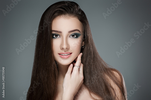 beautiful woman with green evening make-up
