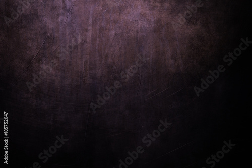 dark purple grungy background with spotlight background