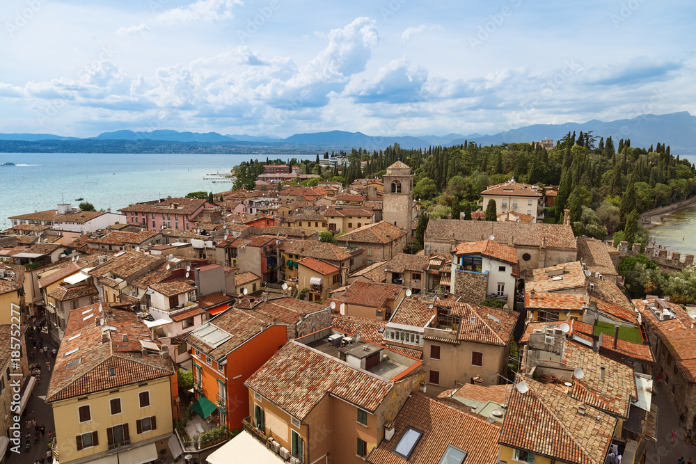 View of small Italian town Sirmione on top of the Scaliger castle. Italian urban landscape in lake Garda.