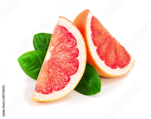 Grapefruit slices with leaves isolated on white background