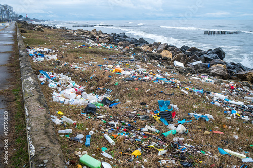 The problem of pollution and ecology of the sea shore and the ocean. Garbage on the coastline and in the world © k_samurkas
