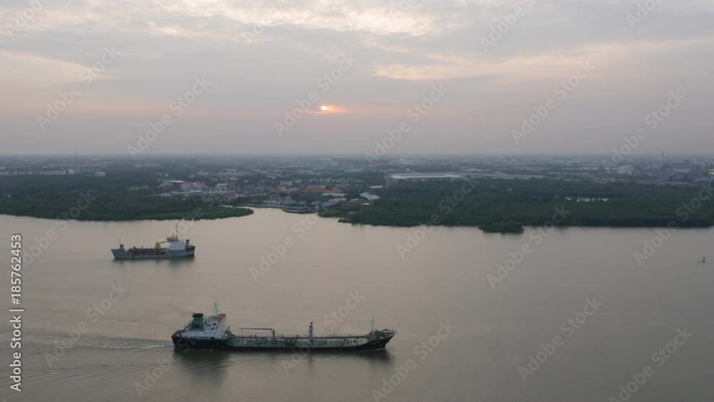 Aerial view of chemical transport tanker ship Passing in Chao Phraya river. Bangkok, Thailand Aerial view of chemical transport tanker ship Passing in Chao Phraya river. Bangkok, Thailand