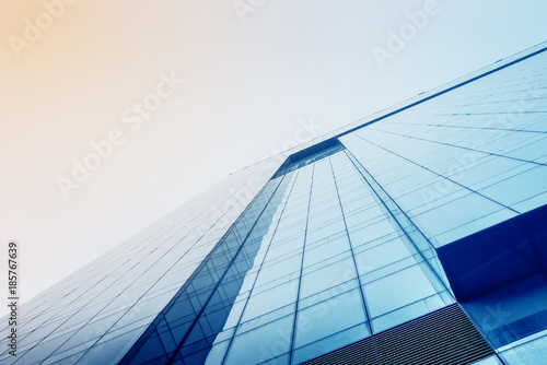 Modern business center of glass and metal - abstract wall of glass