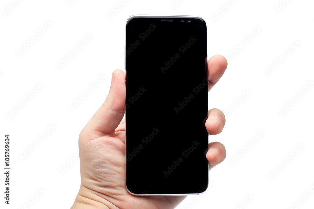 Smartphone in hand on a white background. Smartphone in hand on a white background.