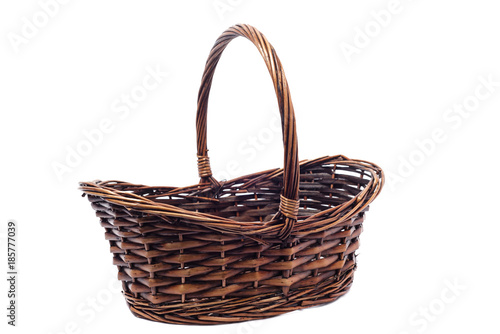 Empty wicker basket isolated on white background