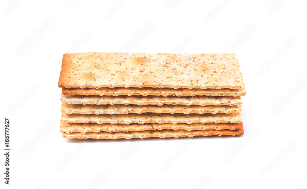 stack of square crackers isolated on white background. Dry cracker cookies isolated stack of square crackers isolated on white background. Dry cracker cookies isolated