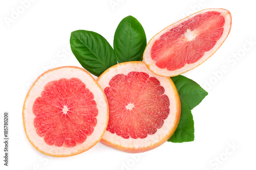 Grapefruit slices with leaves isolated on white background. Top view