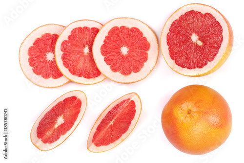 Grapefruit and slices isolated on white background. Top view. Flat lay pattern
