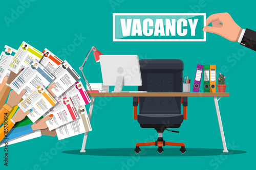 Office chair, sign vacancy, box with office itmes