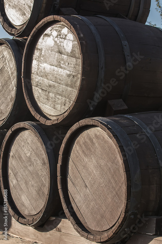 Wooden barrels in a pile. Closeup.