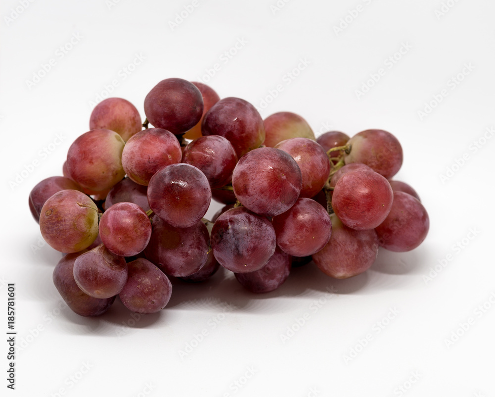 Red Grape bunch was isolated on the white background Red Grape bunch was isolated on the white background