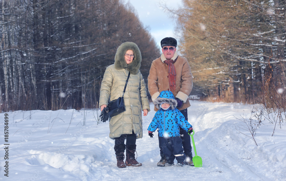 family walks on Winter Park during the weekend