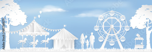 Happy Family in Amusement park with ferris wheel and carousel paper art style, paper cut background