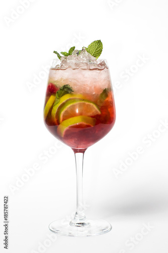 Glass of red cherry soda drink isolated on white background. From top view