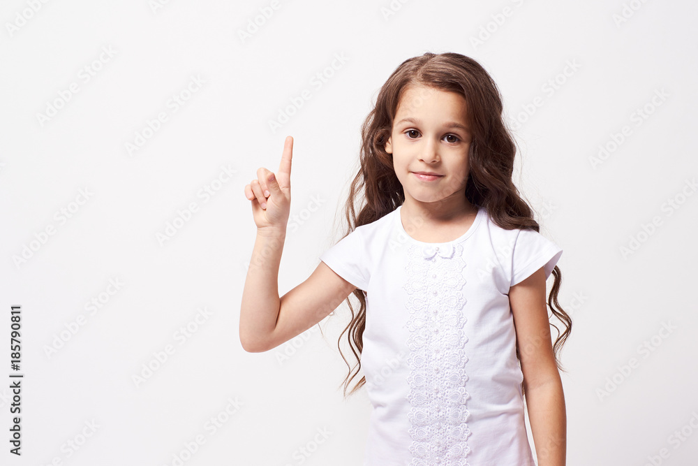 Beautiful portrait. Little girl. White background Beautiful portrait. Little girl. White background