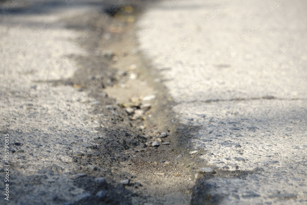 cracked asphalt after earthquake