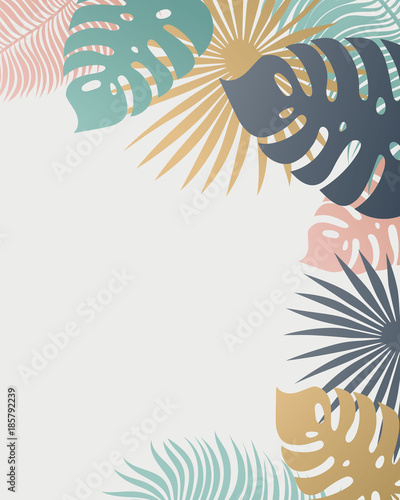 Exotic leaves and flowers with copy space. Tropical frame design. Beautiful b...