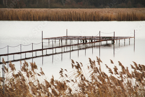 empty platform for a post-apo looking cottage on Hermanicky pond, Czech Republic photo