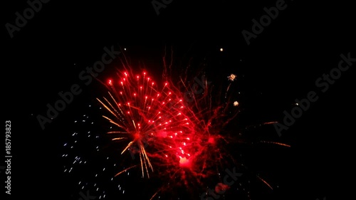 Colorful fireworks at holiday night. 4к video of salutes.

