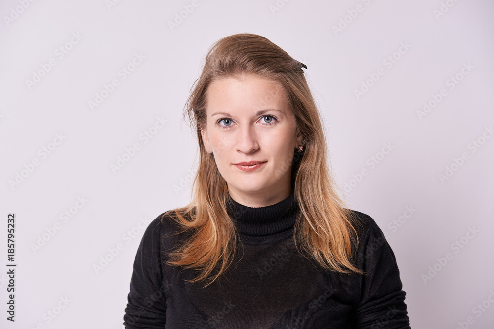 Portrait beautiful girl. Black jacket. White background Portrait beautiful girl. Black jacket. White background