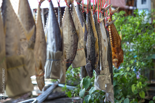 dried fish hanging on a rope, a life and business fisherman