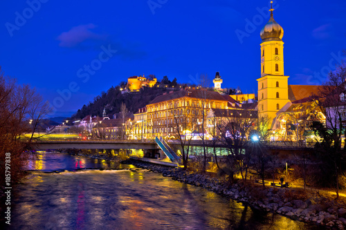 Mur river and Graz cityscape evening view