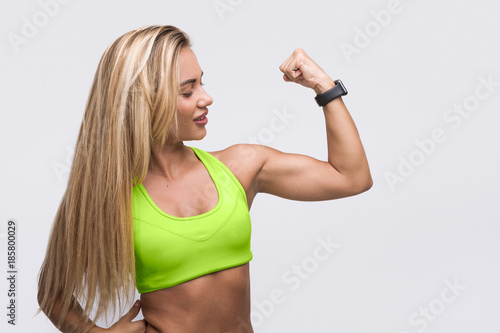 Woman showing biceps