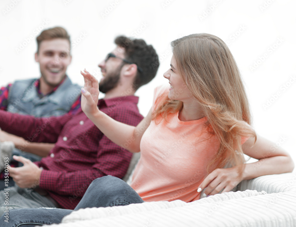 group of young people going on the couch. group of young people going on the couch.