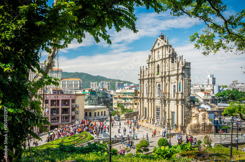Ruins of Saint Paul's Catholic Church with tourists. They are one of Macau's famous landmarks. photo