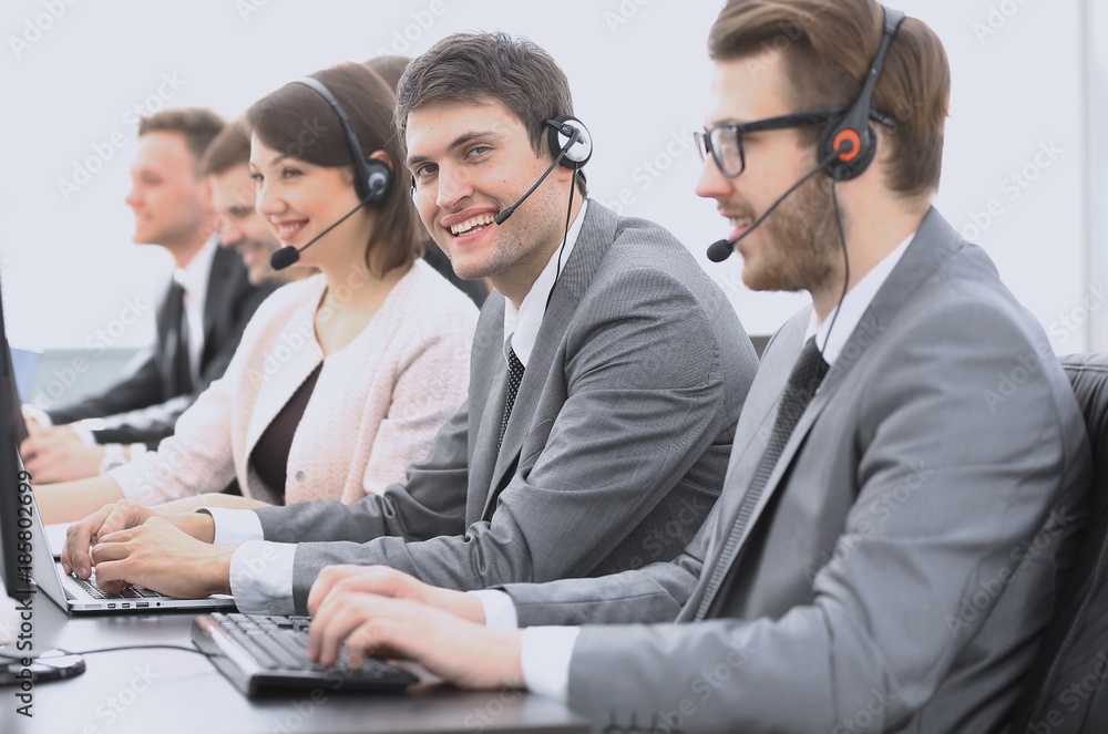 employee call center with headset at workplace employee call center with headset at workplace