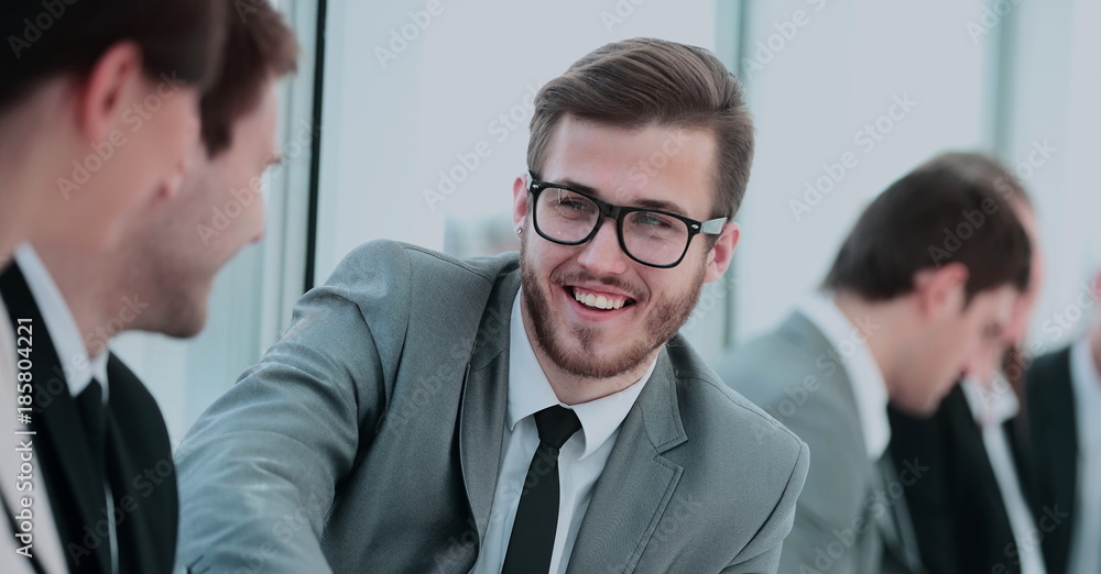 closeup of a successful Manager is sitting in the lobby on the b closeup of a successful Manager is sitting in the lobby on the b