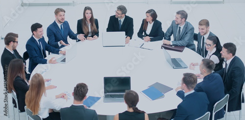 CEO listens to the speech of the employee of the company at the 