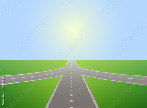 Road leading to horizon and sunlit sky. 