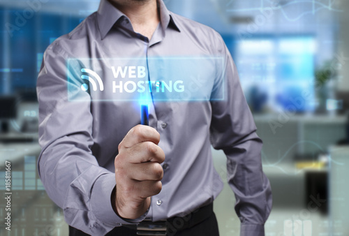 The concept of business, technology, the Internet and the network. A young entrepreneur working on a virtual screen of the future and sees the inscription: Web hosting