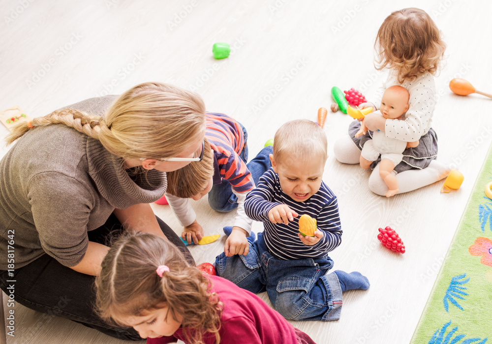 Naklejka premium Games in kindergarten