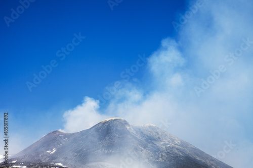 Smoking summit of Etna volcano, Sicily, Italy.