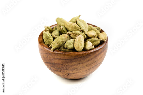 Pile of cardamom pods isolated on a white background