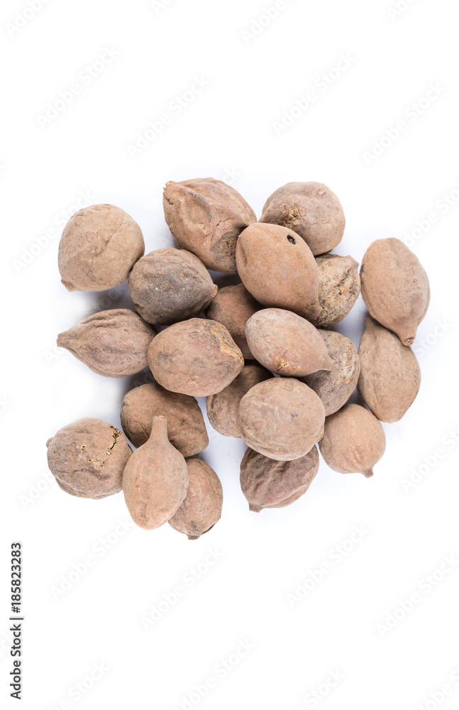 Pile of terminalia bellerica isolated on a white background Pile of terminalia bellerica isolated on a white background