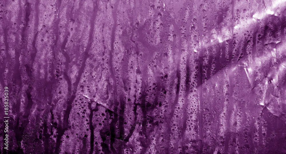 Condensation drops on PVC wrap in purple color.