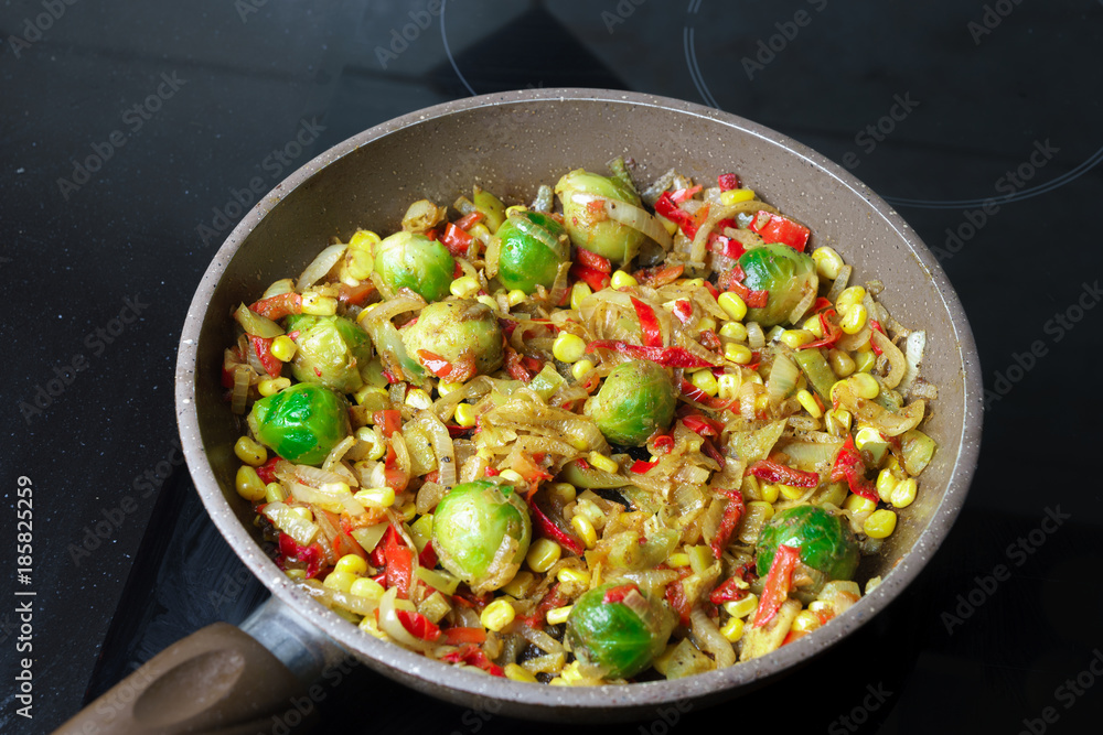 Brussels sprouts roasted with pepper and onions Brussels sprouts roasted with pepper and onions