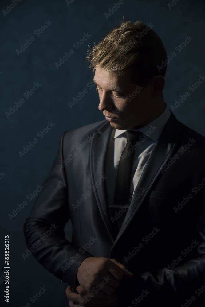young man businessman thinking in office