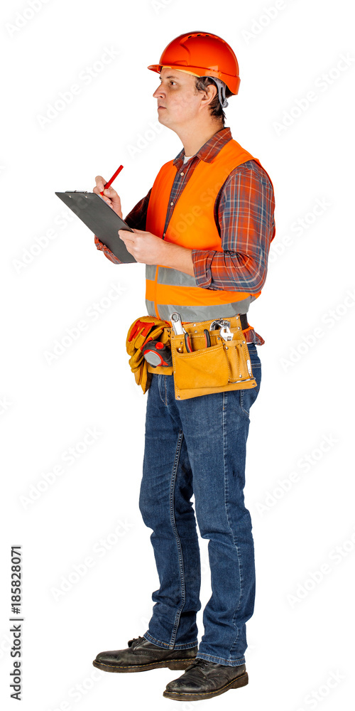 Full length portrait of a male builder in a orange helmet over white wall background. repair, construction, building, people and maintenance concept.. Full length portrait of a male builder in a orange helmet over white wall background. repair, construction, building, people and maintenance concept..