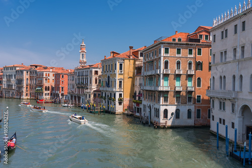 Magnificent daily view of Gondola with classical buildings along the famous Grand canal in Venice, Italy