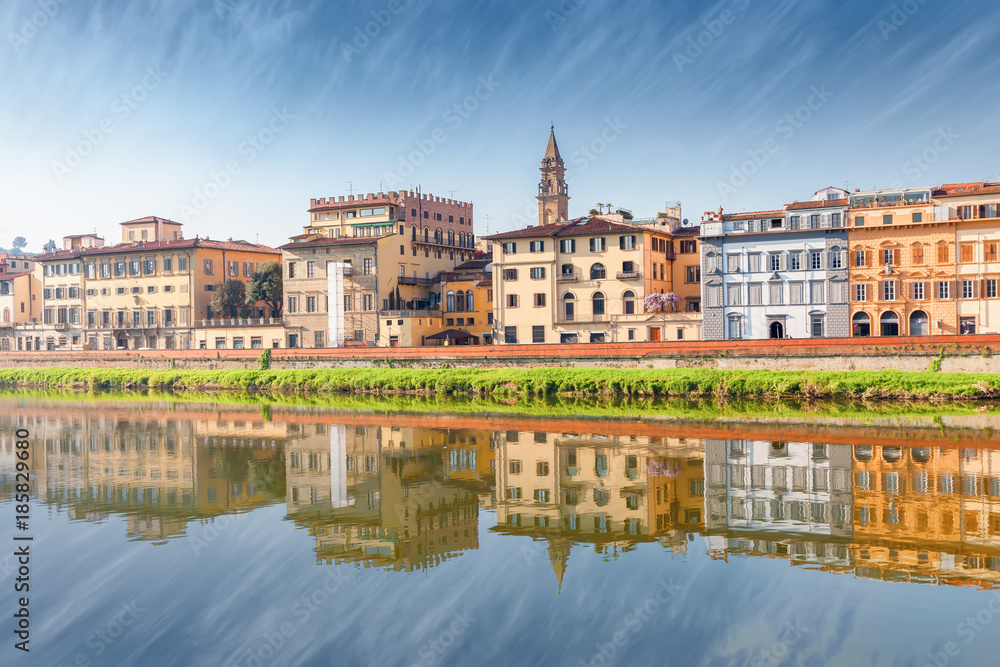 Quay of the Arno River with reflection in Florence